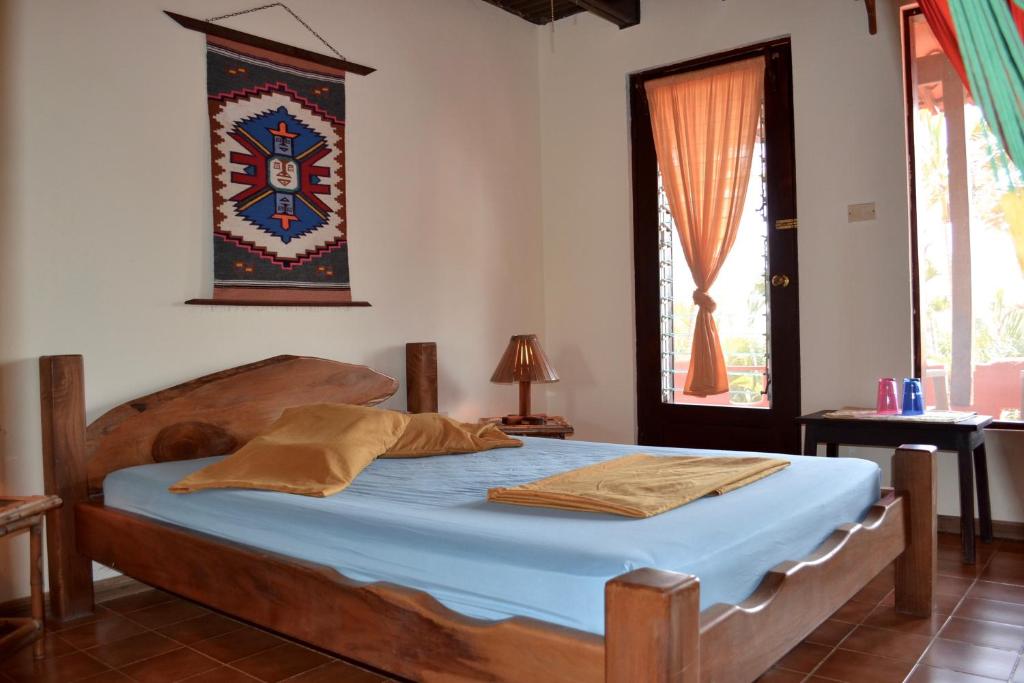 Postel nebo postele na pokoji v ubytování El Castillo Divertido