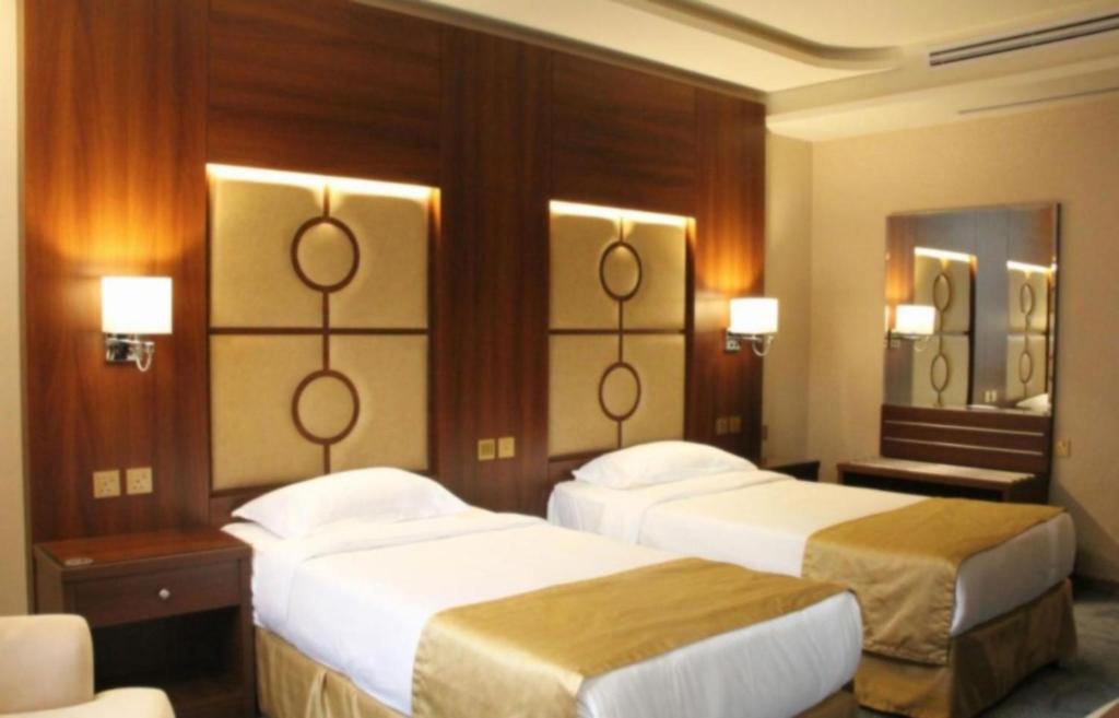 Postel nebo postele na pokoji v ubytování Sunday Harbour Gateway Jeddah Beach Hotel