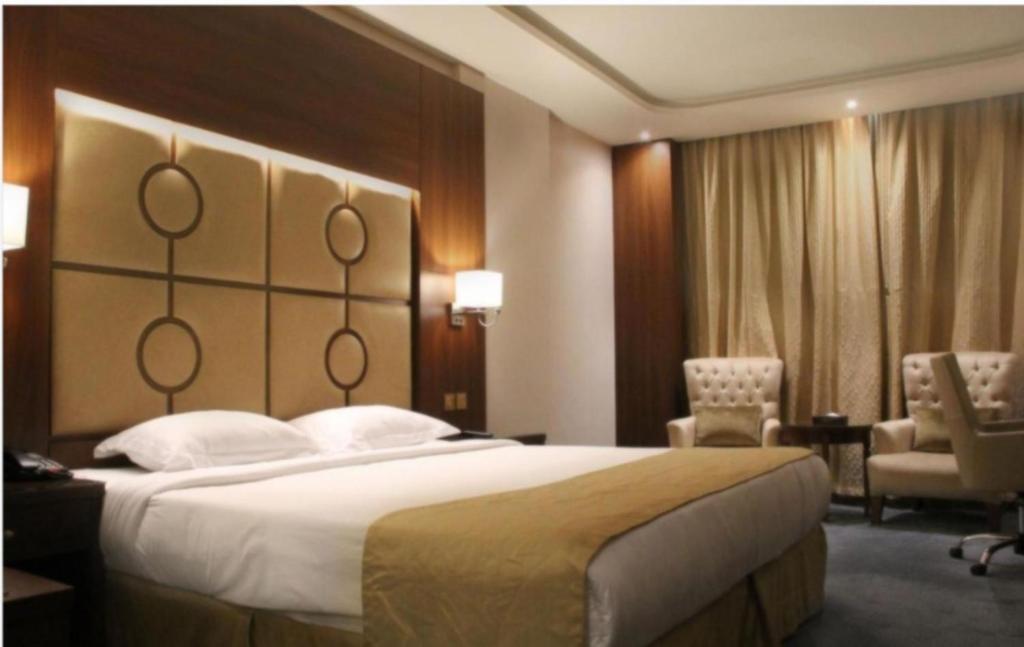 Postel nebo postele na pokoji v ubytování Sunday Harbour Gateway Jeddah Beach Hotel