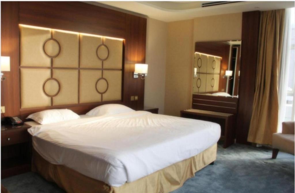 Postel nebo postele na pokoji v ubytování Sunday Harbour Gateway Jeddah Beach Hotel