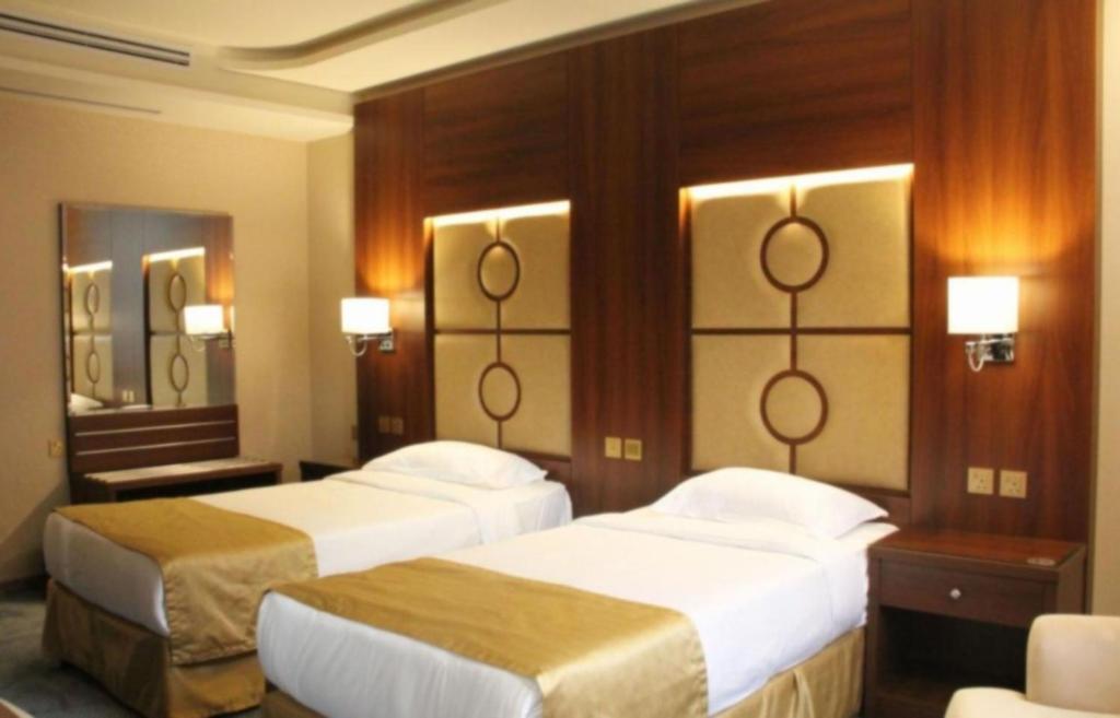 Postel nebo postele na pokoji v ubytování Sunday Harbour Gateway Jeddah Beach Hotel