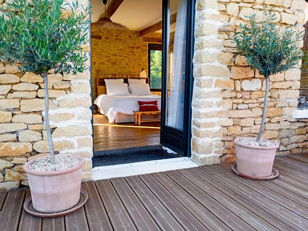 Katil atau katil-katil dalam bilik di Douceur de vivre à Sarlat