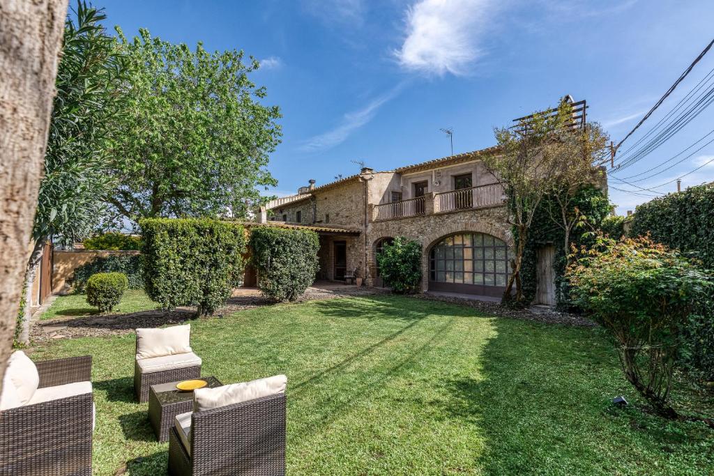 En have udenfor Villa con encanto Jardín, Wifi y Ac