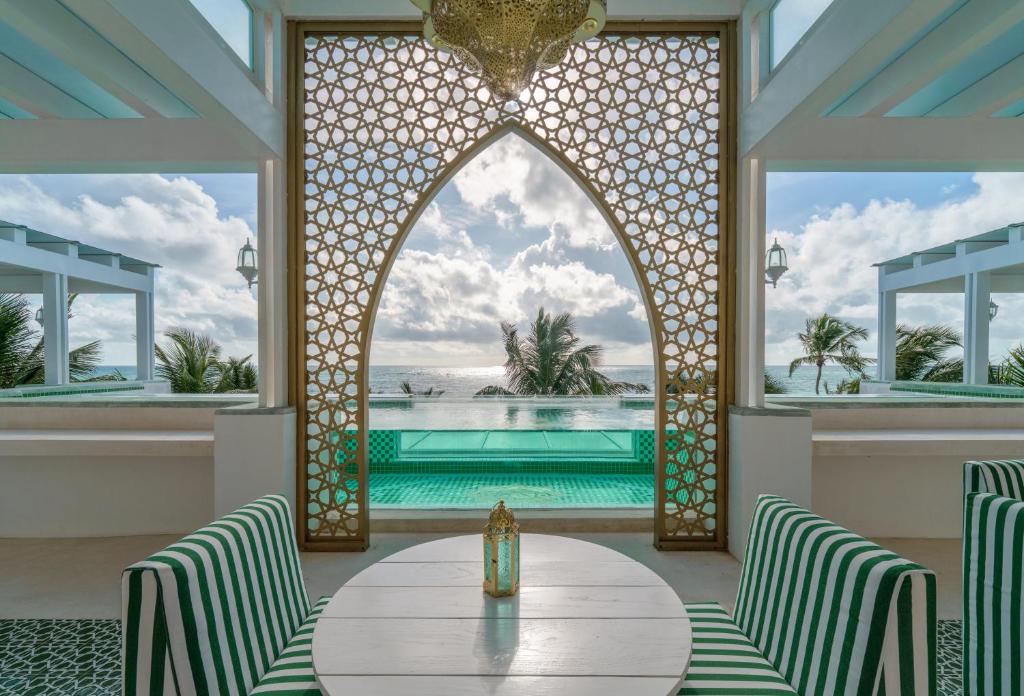 Бассейн в Sana Tulum Beachfront Boutique Hotel или поблизости