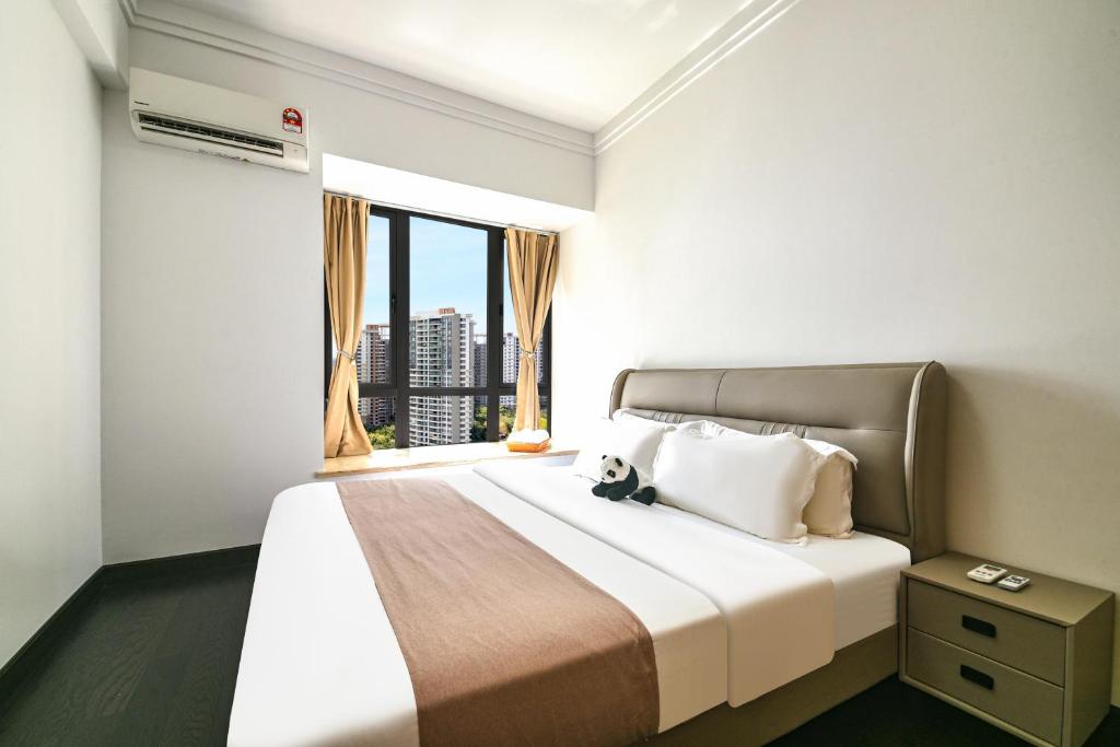 Postel nebo postele na pokoji v ubytování R&F Princess Cove Seine Region by FUJU with Seaview at JB City Centre#Adjacent to Singapore#5 mins walk to ClQ#Free Parking#中英文房东