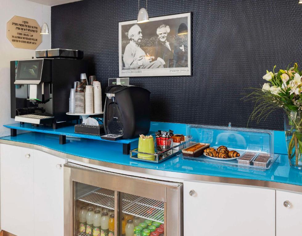 Kuchyň nebo kuchyňský kout v ubytování Best Western Regency Suites