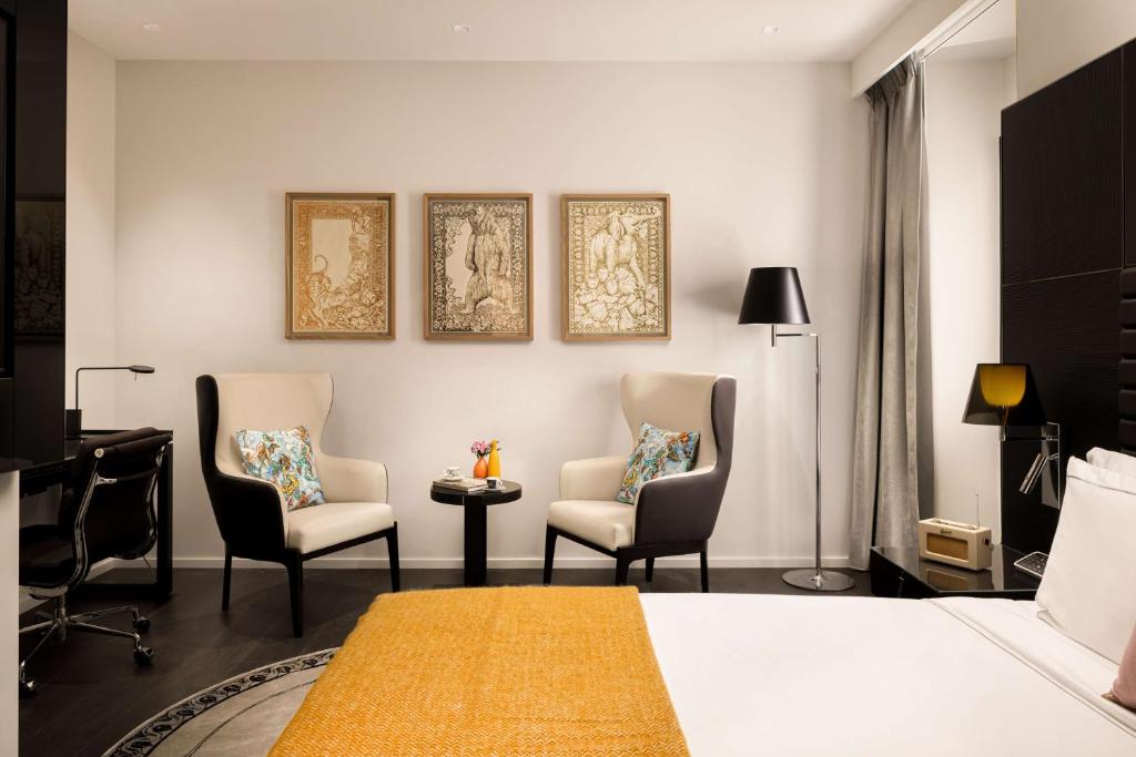 Postel nebo postele na pokoji v ubytování art'otel Rome Piazza Sallustio, Powered by Radisson Hotels