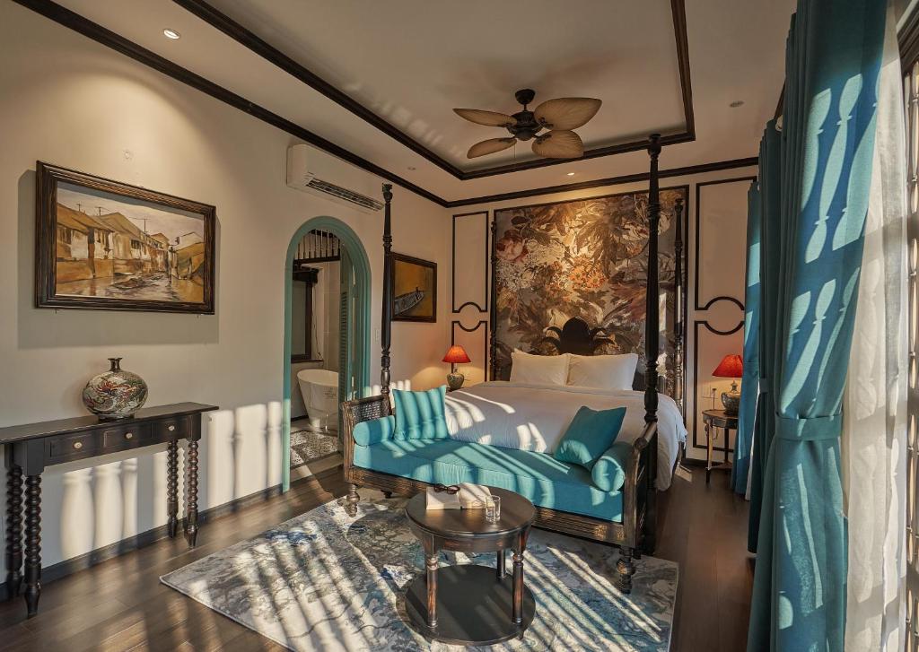 Giường trong phòng chung tại The An Bang Vanessa - Indochine Boutique Hotel