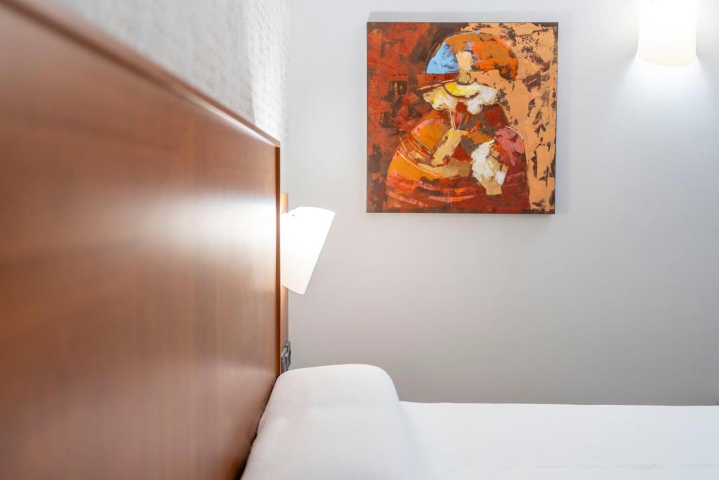 Postel nebo postele na pokoji v ubytování Torreluz Centro