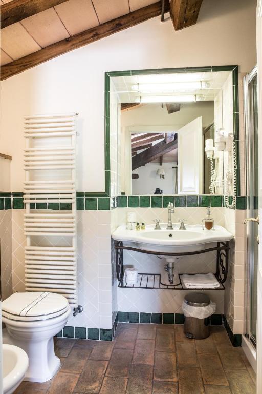 Kúpeľňa v ubytovaní Hotel Relais Santa Genoveffa