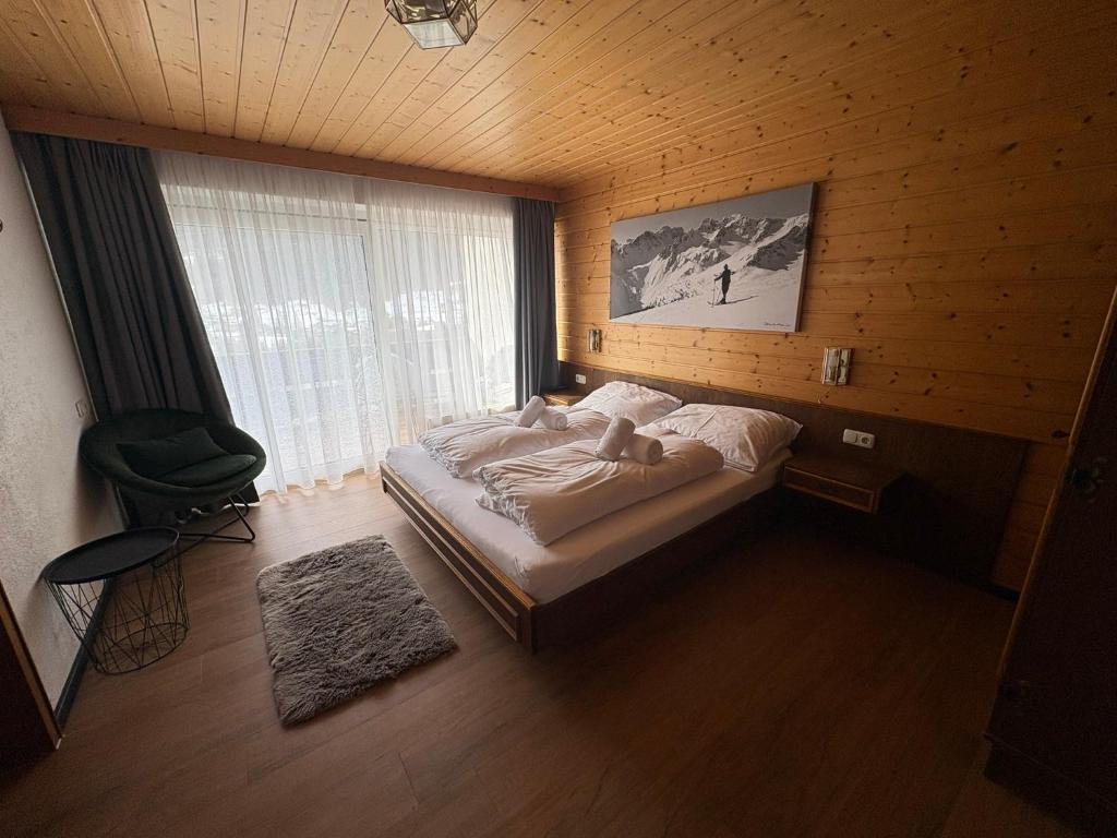 Posteľ alebo postele v izbe v ubytovaní Chalet H Montafon