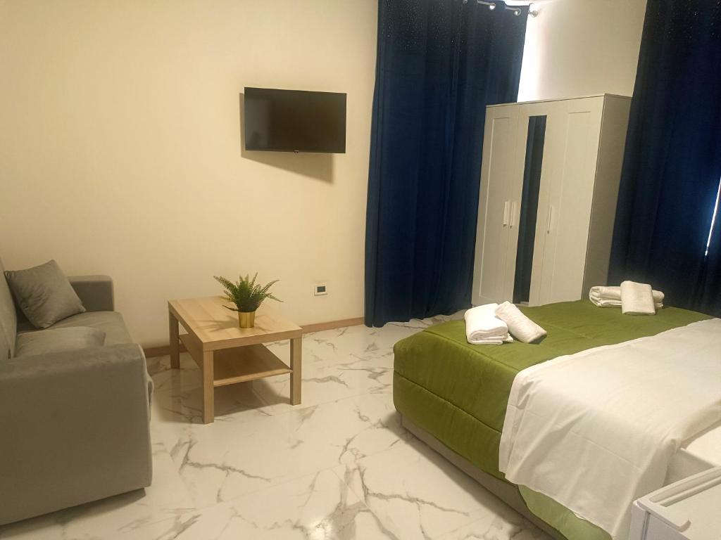 Postel nebo postele na pokoji v ubytování TMS Venice Rooms