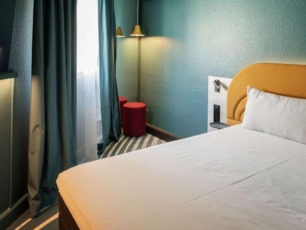Postel nebo postele na pokoji v ubytování ibis Styles Brugge Centrum