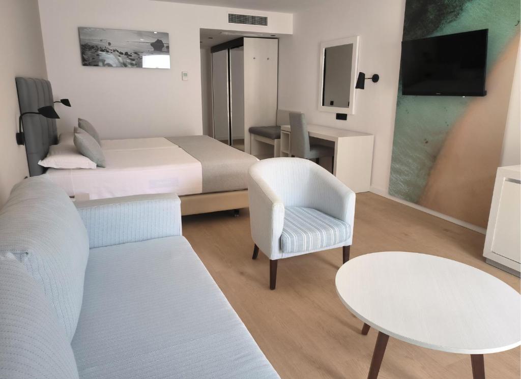 Postel nebo postele na pokoji v ubytování Hotel Las Costas