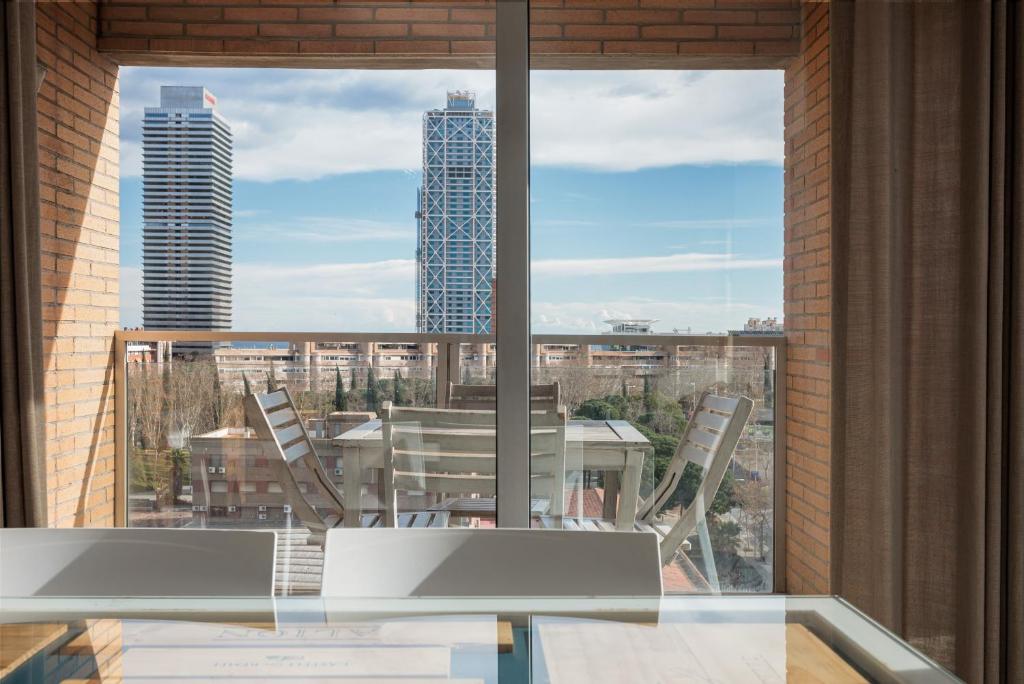 A balcony or terrace at Enjoybcn Marina Apartment