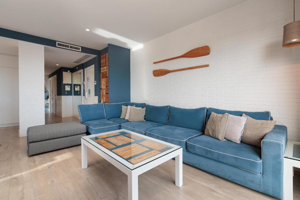 A seating area at Enjoybcn Marina Apartment