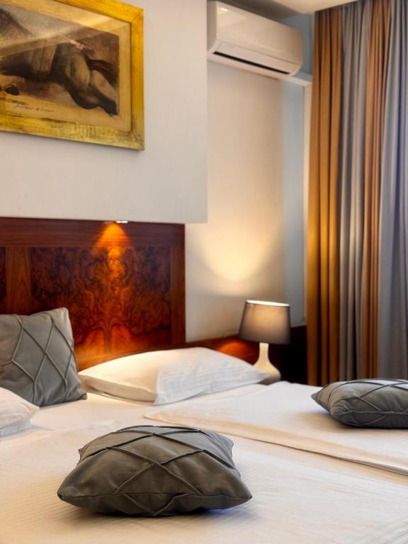 Postel nebo postele na pokoji v ubytování Hotel Exclusive