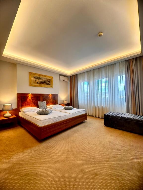 Postel nebo postele na pokoji v ubytování Hotel Exclusive