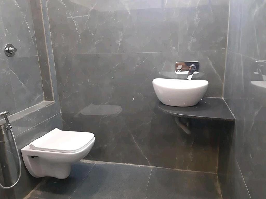 Koupelna v ubytování Hotel Sangam sagar