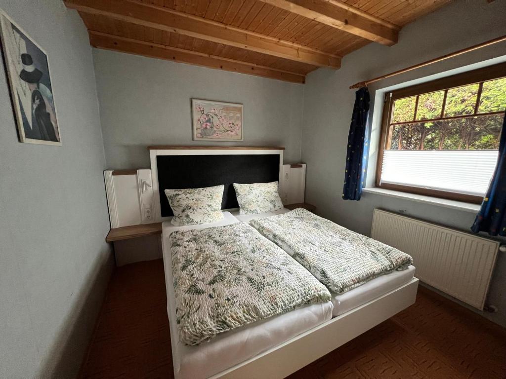 Ein Bett oder Betten in einem Zimmer der Unterkunft Alex HA03