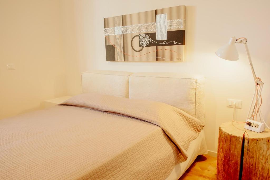 Postel nebo postele na pokoji v ubytování Venti D'Amare Suites