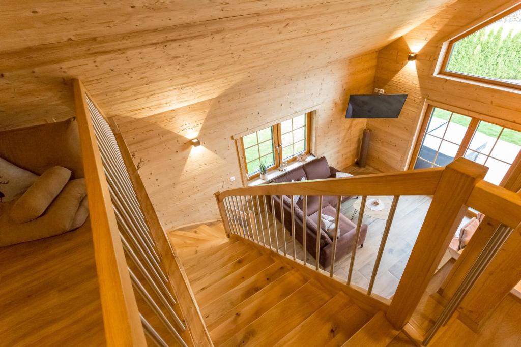 TV a/nebo společenská místnost v ubytování Chalet Hüttenzauber