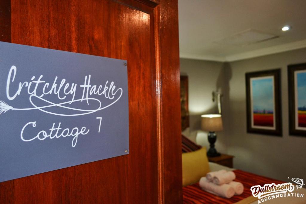 Et logo, certifikat, skilt eller en pris der bliver vist frem på Critchley Hackle Cottage 7