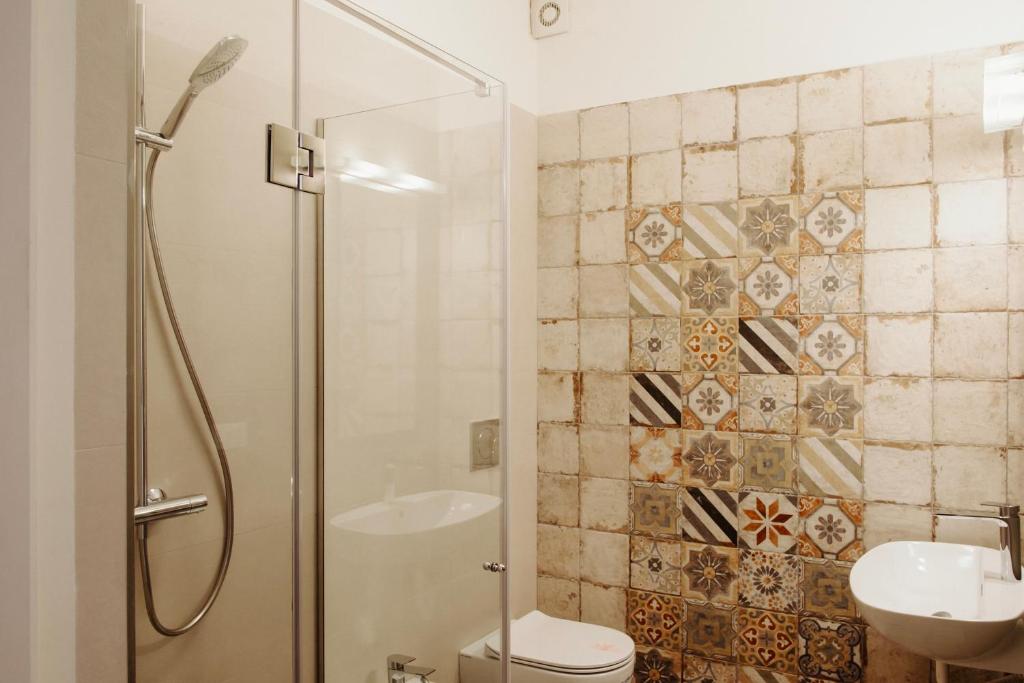 Koupelna v ubytování Venti D'Amare Suites