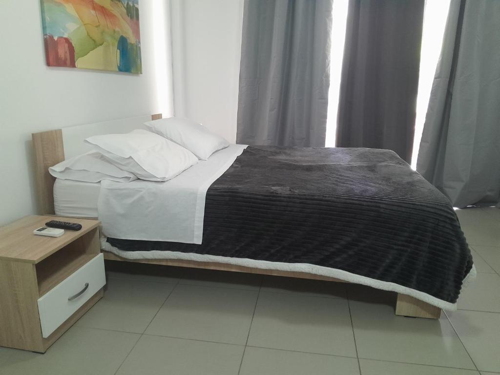 Postel nebo postele na pokoji v ubytování Holiday and Business Home