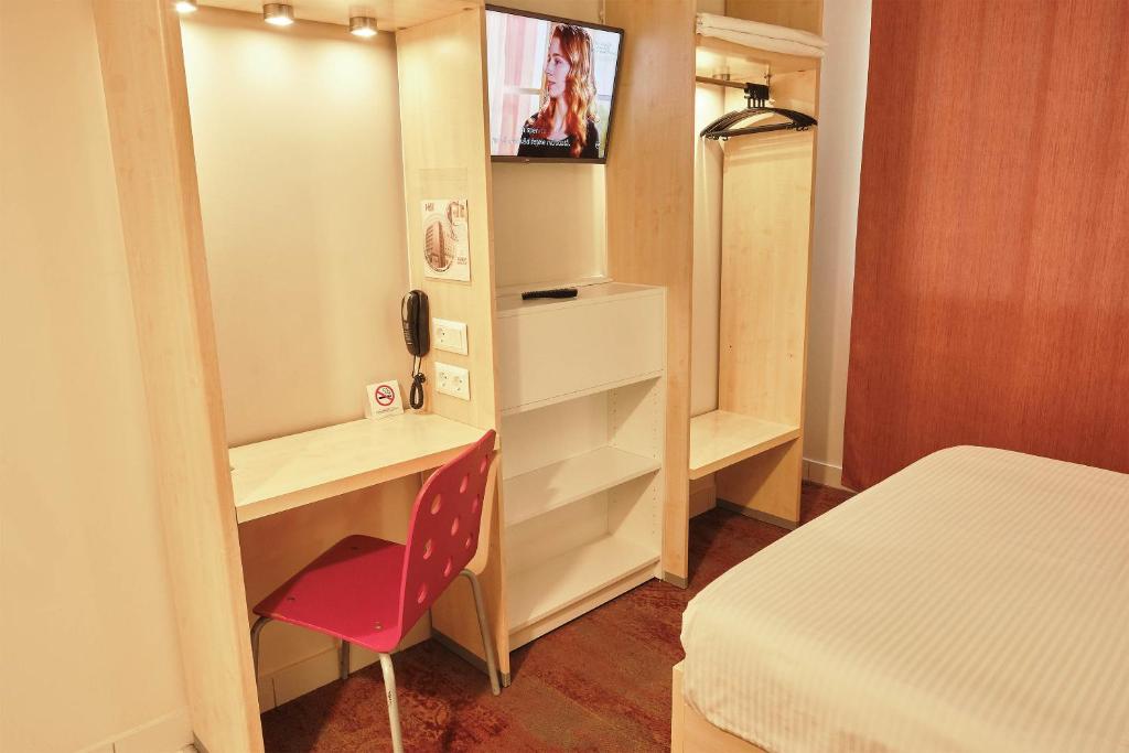 TV a/nebo společenská místnost v ubytování Hello Hotels Bucuresti Gara de Nord