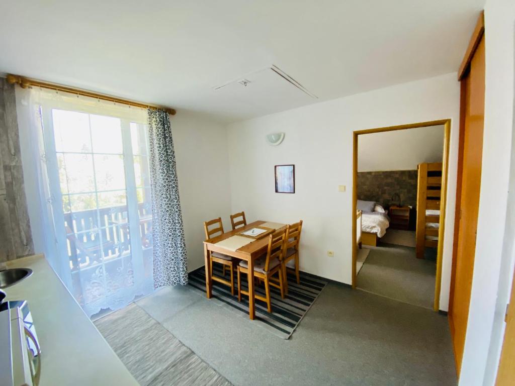 Postel nebo postele na pokoji v ubytování Apartmány na Horce