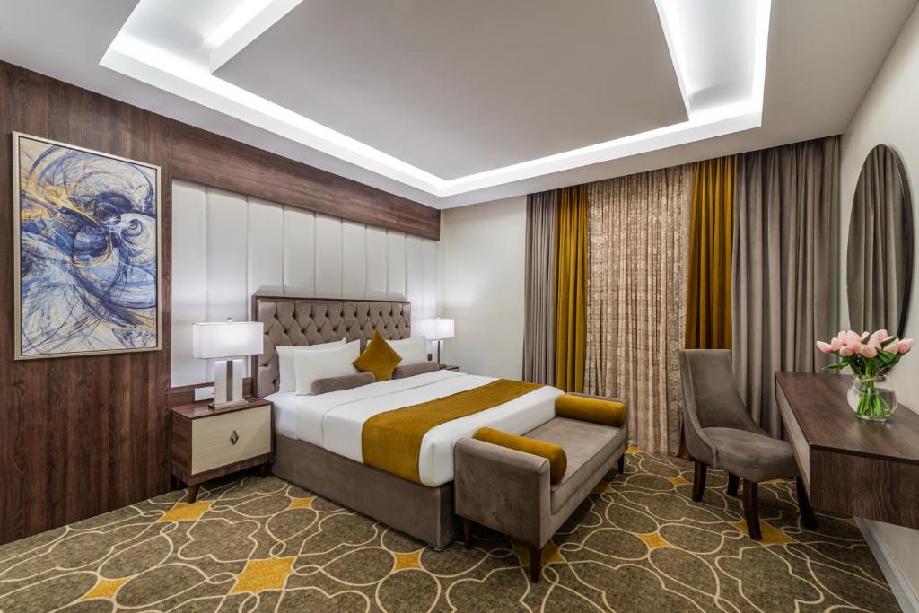 Postel nebo postele na pokoji v ubytování Garden Millennium Hotel