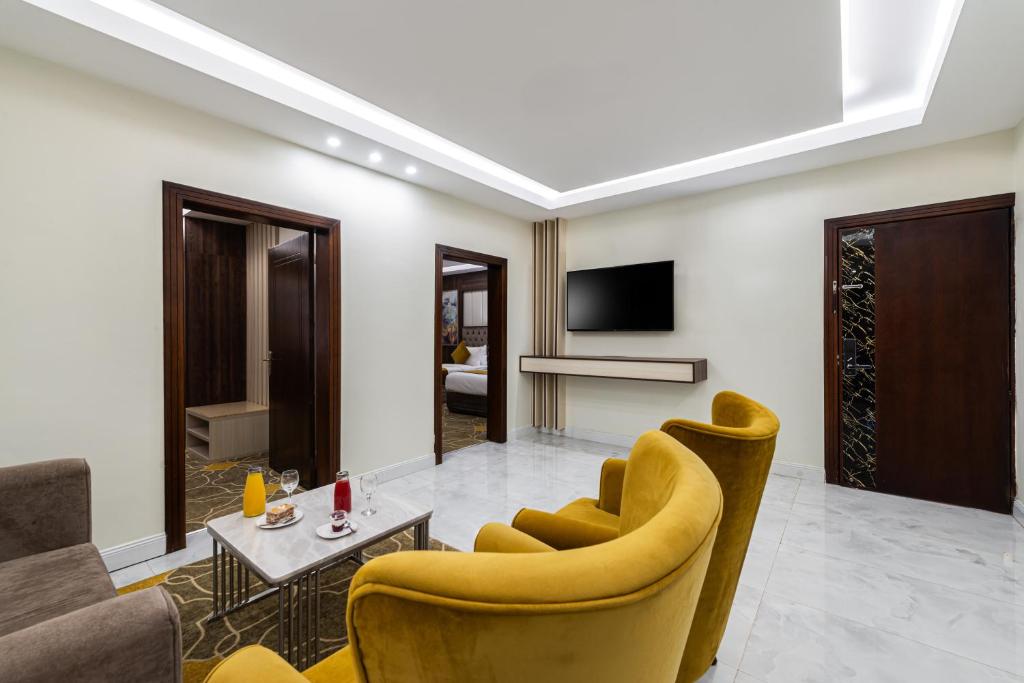 TV a/nebo společenská místnost v ubytování Garden Millennium Hotel