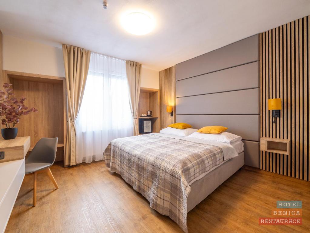 Cama o camas de una habitación en Hotel Benica