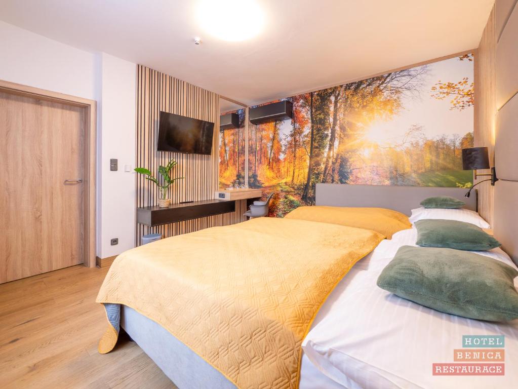 Cama o camas de una habitación en Hotel Benica