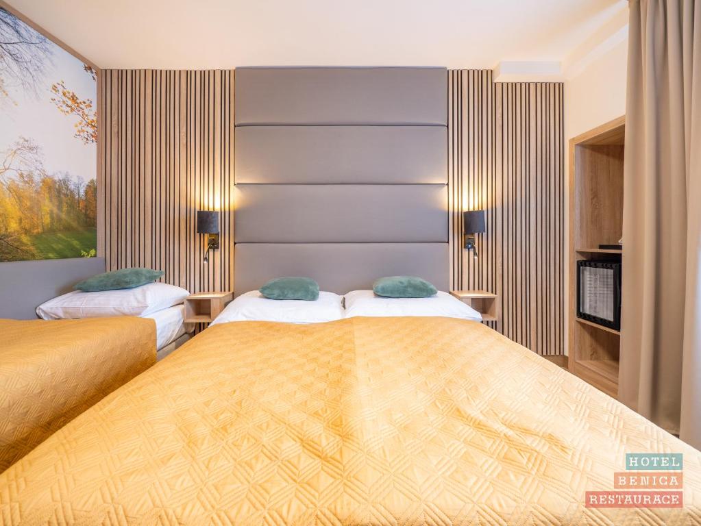 Cama o camas de una habitación en Hotel Benica