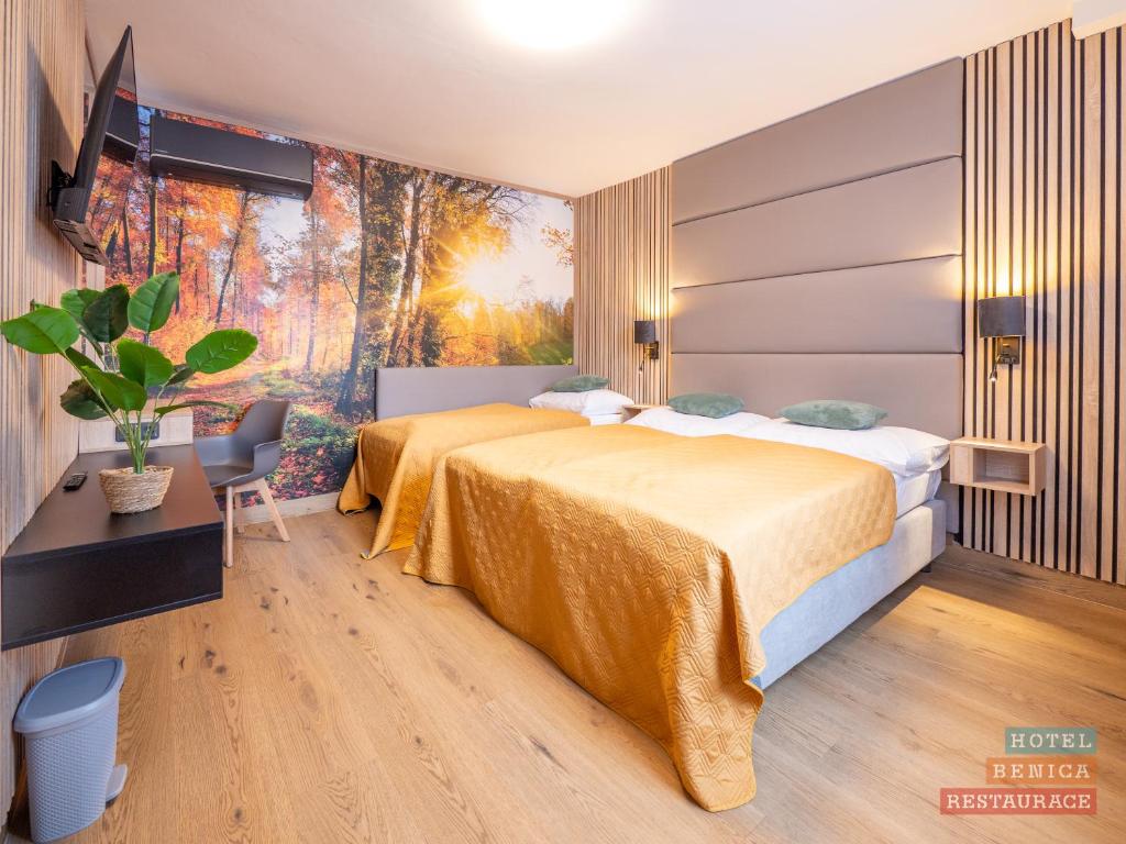 Cama o camas de una habitación en Hotel Benica