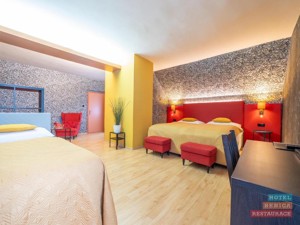 Cama o camas de una habitación en Hotel Benica