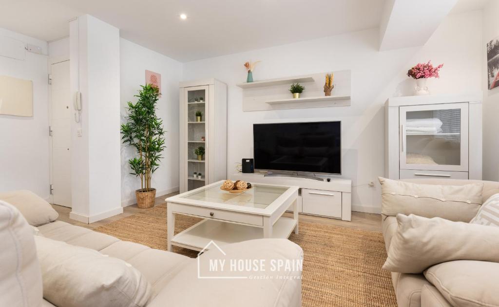 TV a/nebo společenská místnost v ubytování MyHouseSpain - Piso en centro Gijón a pocos minutos de las playas