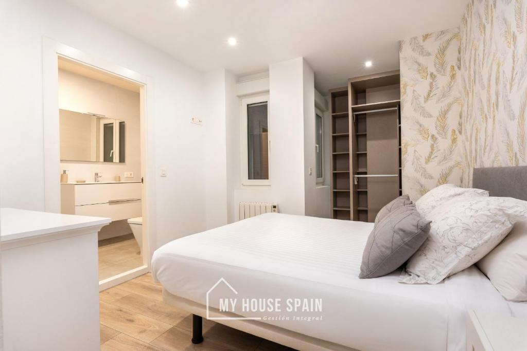 Postel nebo postele na pokoji v ubytování MyHouseSpain - Piso en centro Gijón a pocos minutos de las playas