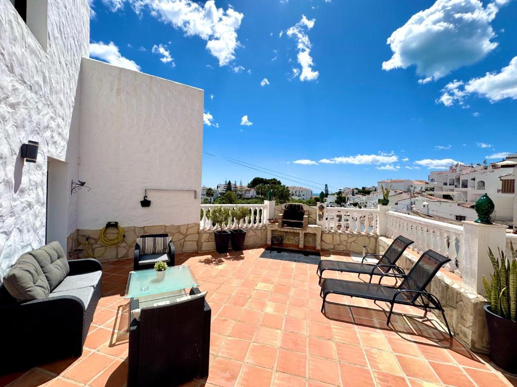 Posezení v ubytování Casa en Nerja con gran terraza, muy luminosa y en tranquila urbanización