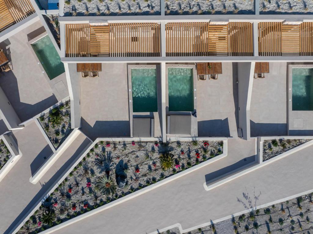 Bazén v ubytování Illusion Suites nebo v jeho okolí