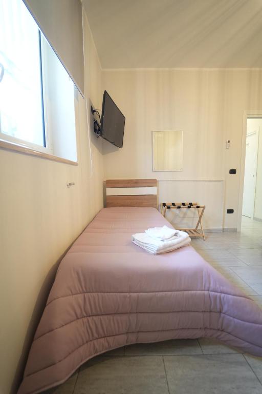 Postel nebo postele na pokoji v ubytování Da Don Antonio