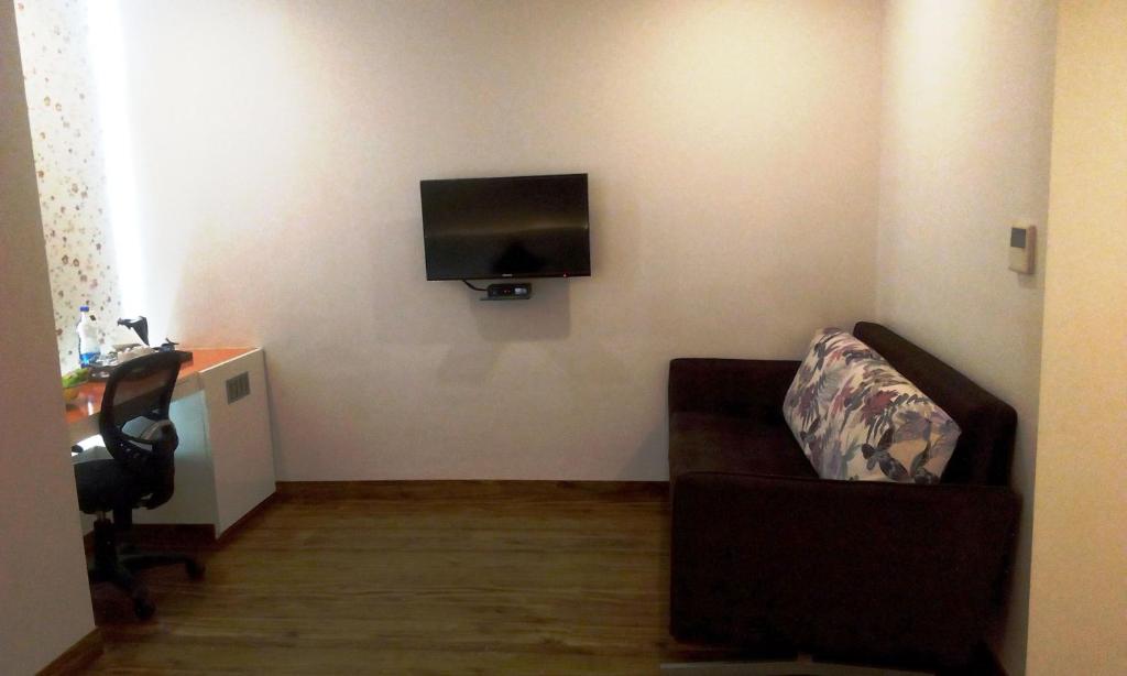 TV a/nebo společenská místnost v ubytování Mango Hotels Prangan