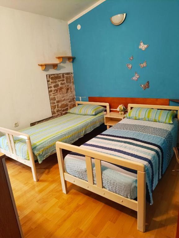Postel nebo postele na pokoji v ubytování Casetta Olivetta