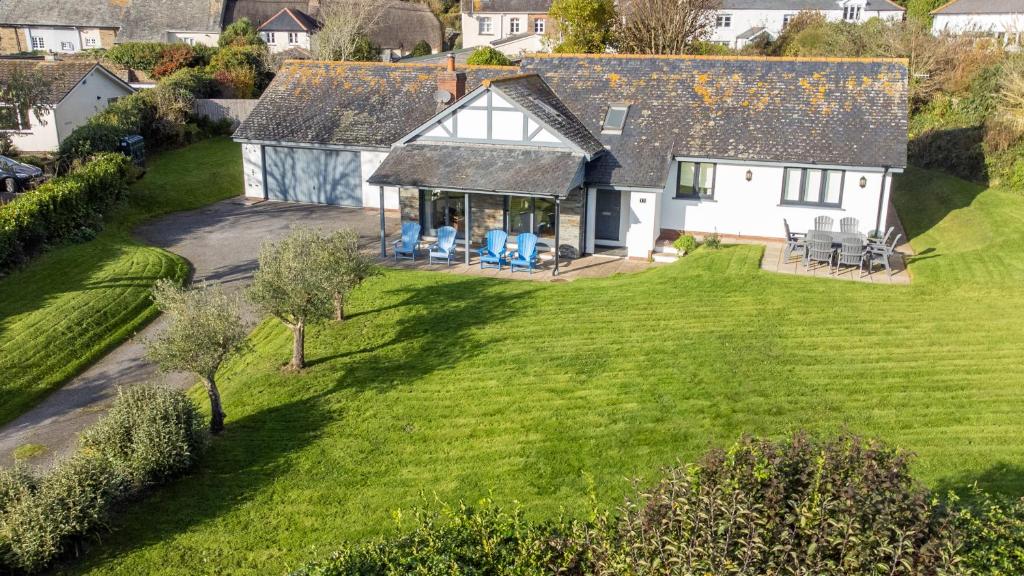an aerial view of a house with a large yard at Family-friendly Bungalow Near Thurlestone Beach in Thurlestone