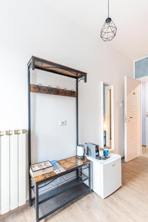a room with a table and a mirror at Bnb Drive In in Rome