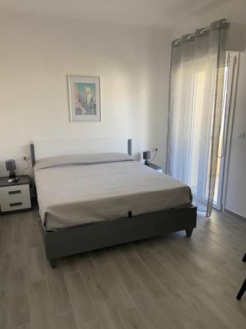 Postel nebo postele na pokoji v ubytování La Giara