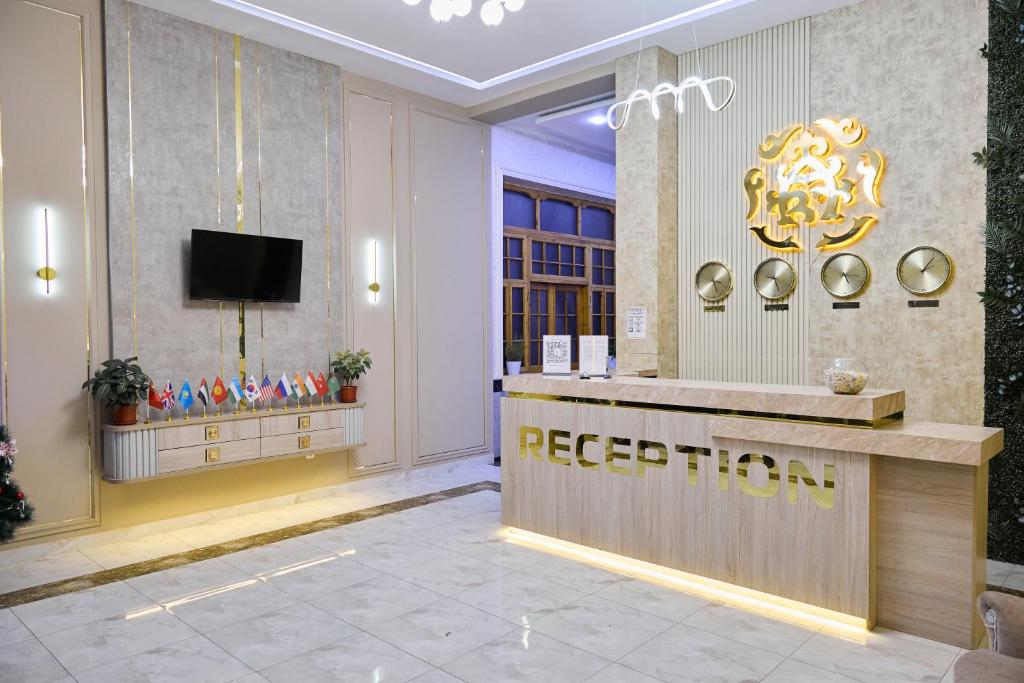 TV a/nebo společenská místnost v ubytování Art Garden Hotel