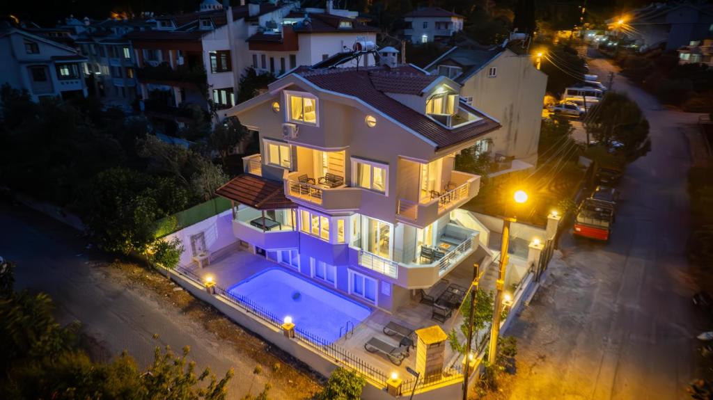 an overhead view of a large house at night at Villa Necati Bey in Marmaris